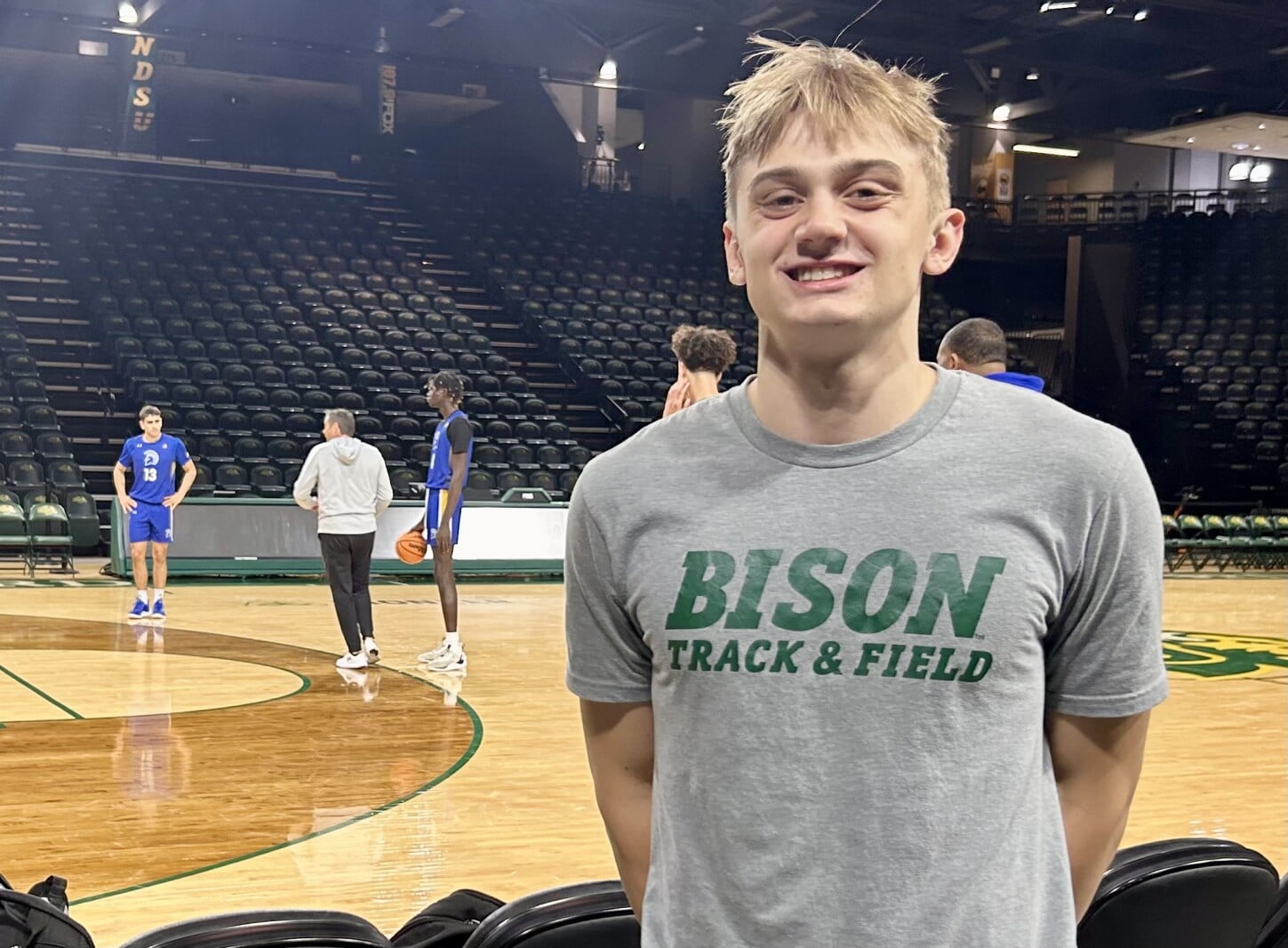Featured image for "Father-Son Collision: Tim Miles' Worlds Unite at Bison Basketball Game"