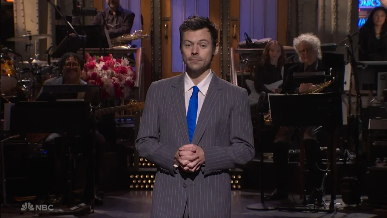 Harry Styles Confronts Queerbaiting Critics on SNL, Finishes with a Kiss