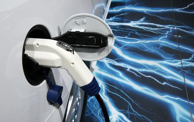 "Tesla's Massive Recall and Rivian's AT&T Partnership Shake Up EV Industry"