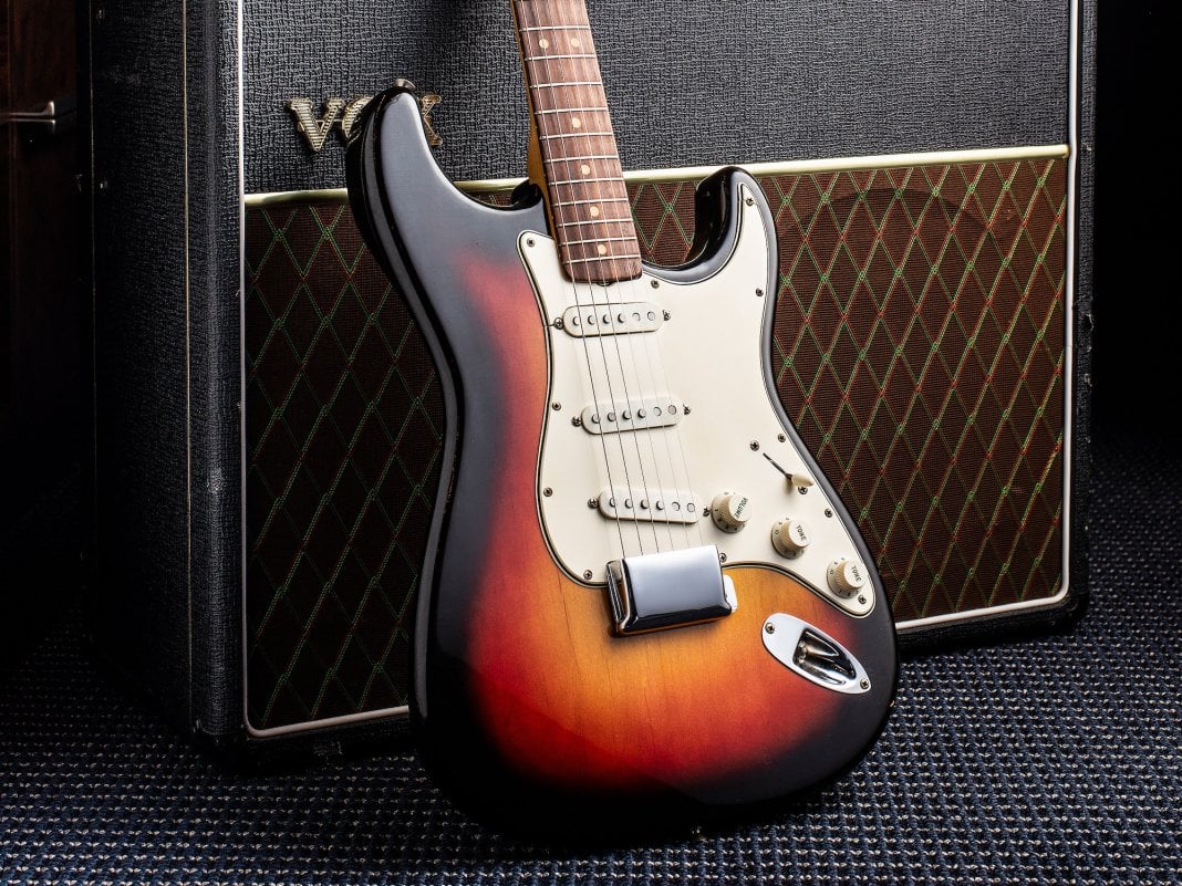 Featured image for "Mark Knopfler's Guitar Collection Fetches Record $11 Million at Auction"