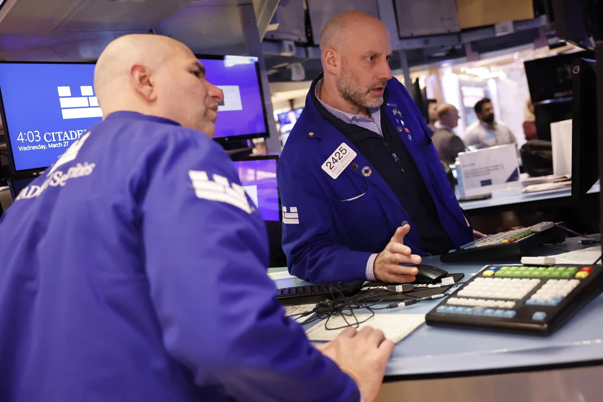 "Inflation Data Sinks Stocks and Sparks Rate-Cut Concerns"
