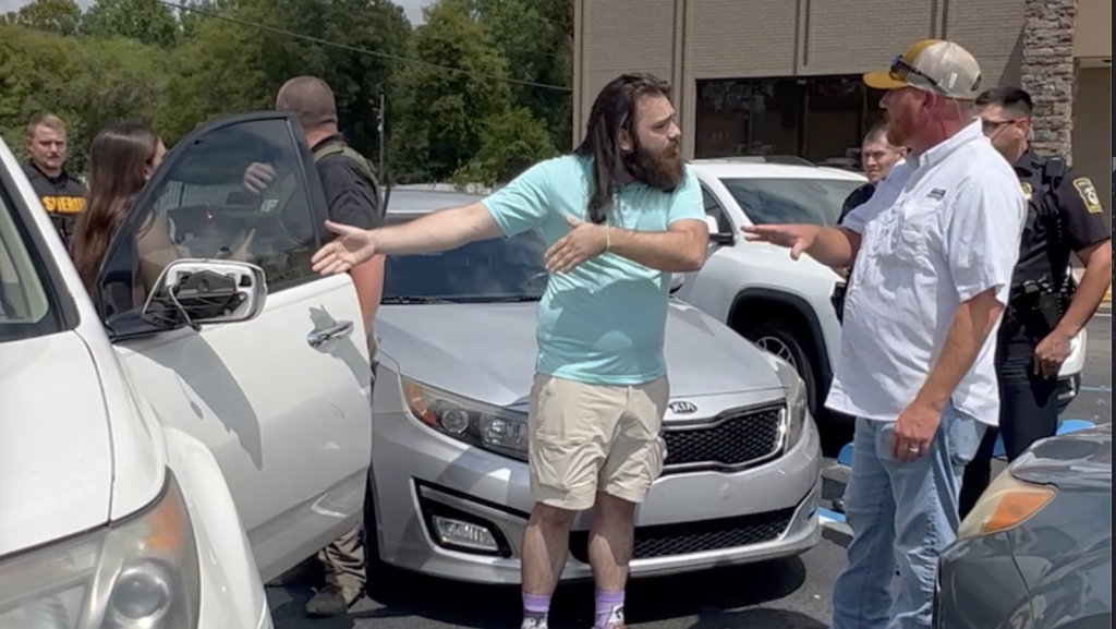 Featured image for Tense library meeting in Ozark leads to undercover cop confrontation with LGBTQ speaker