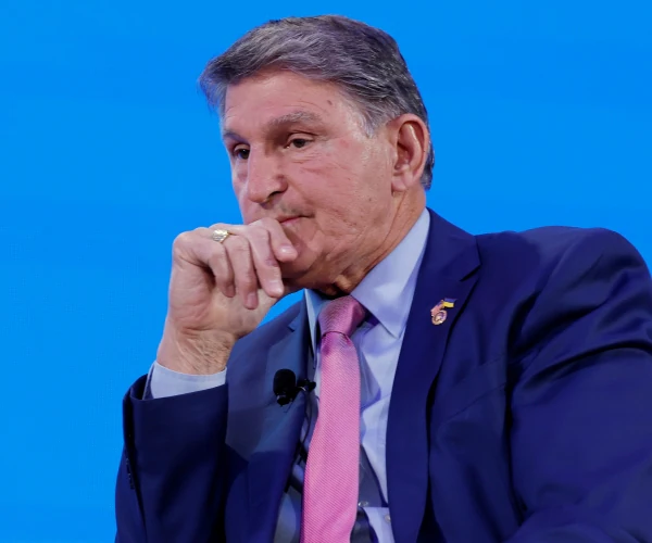 Featured image for Manchin Urges Biden to Pardon Trump for Political Balance