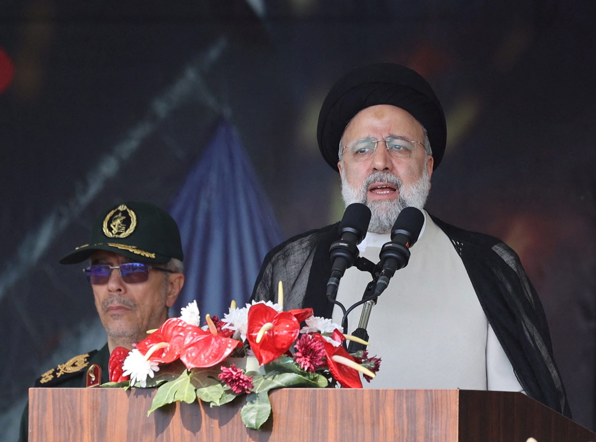 "Iran's President Warns of 'Massive' Response as Israel Considers Retaliatory Action"