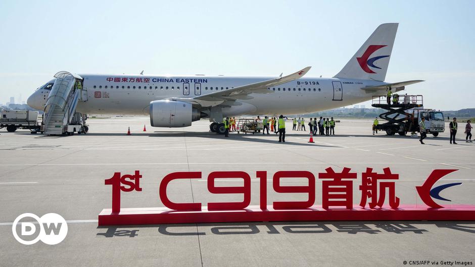 Featured image for China's C919 passenger jet takes on Boeing and Airbus with successful maiden commercial flight.