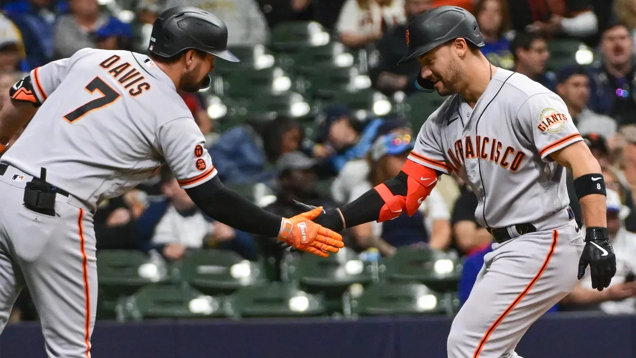 Giants dominate Brewers with power and pitching.