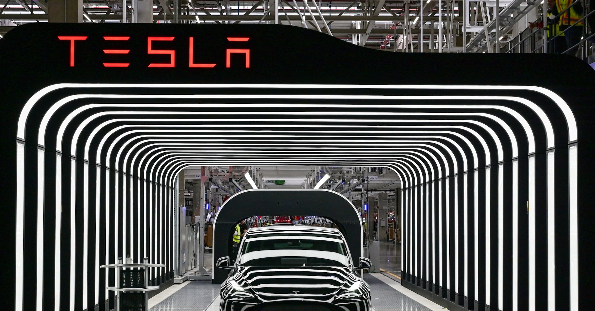 "Tesla Abandons Low-Cost Car Amid Chinese EV Competition, Musk Denies Reports"