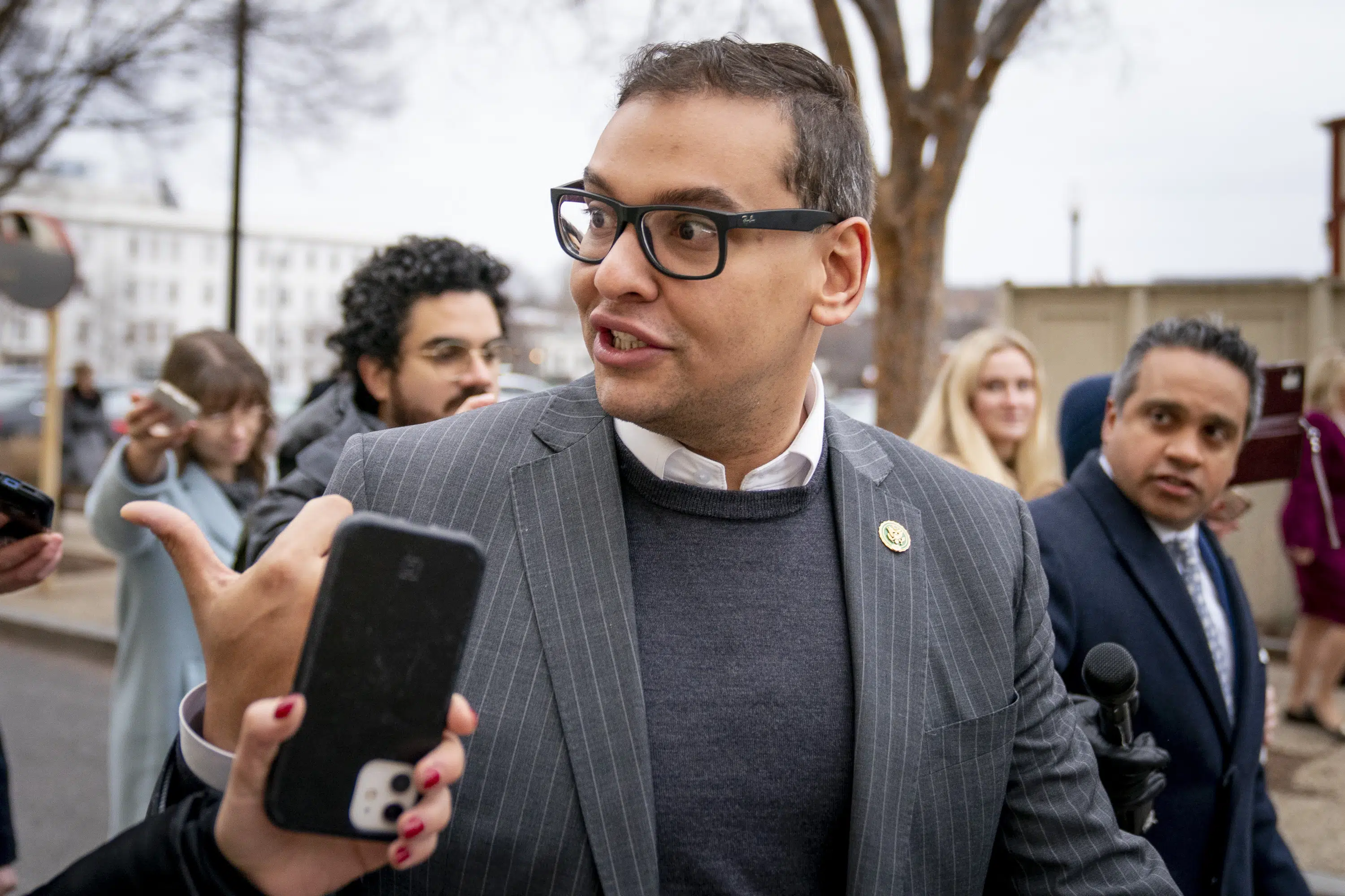 Rep. George Santos faces federal criminal charges in DOJ probe.