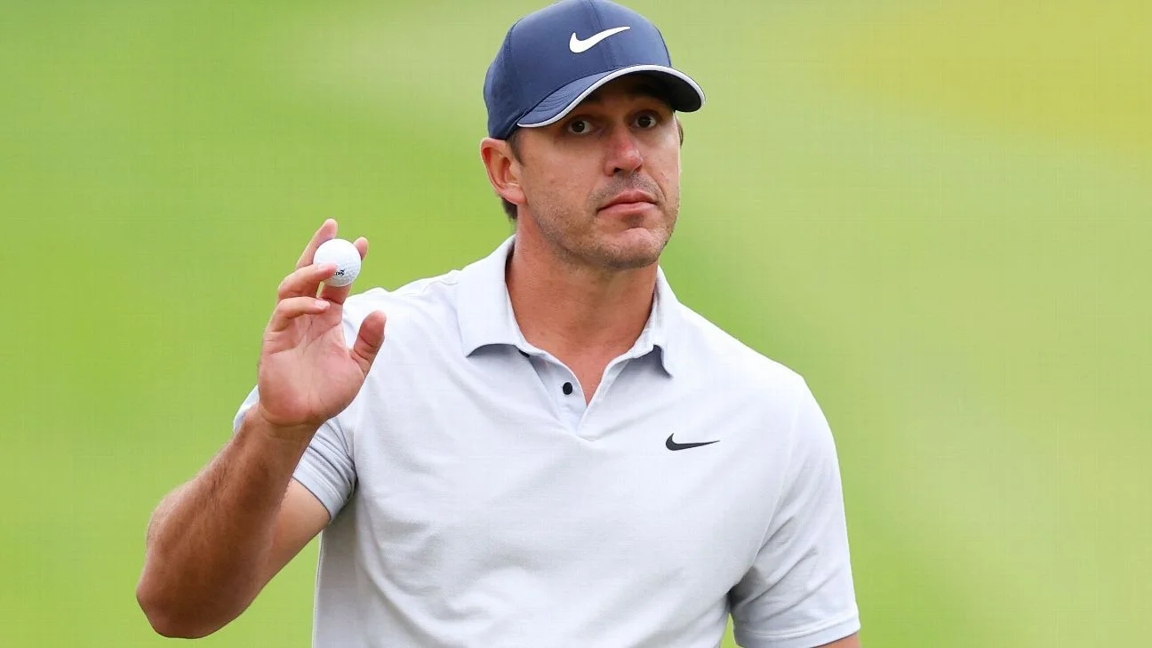 Koepka dominates rainy round to take lead at PGA Championship.