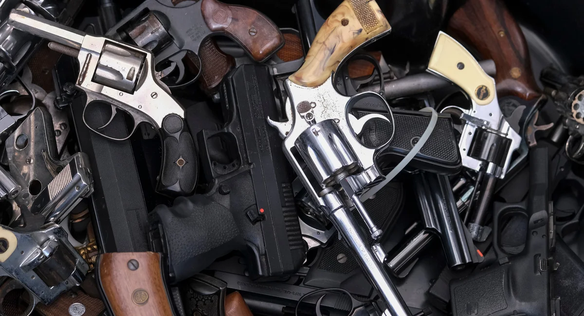 Featured image for Gun buyback programs in New York and Illinois successfully remove thousands of firearms from streets.