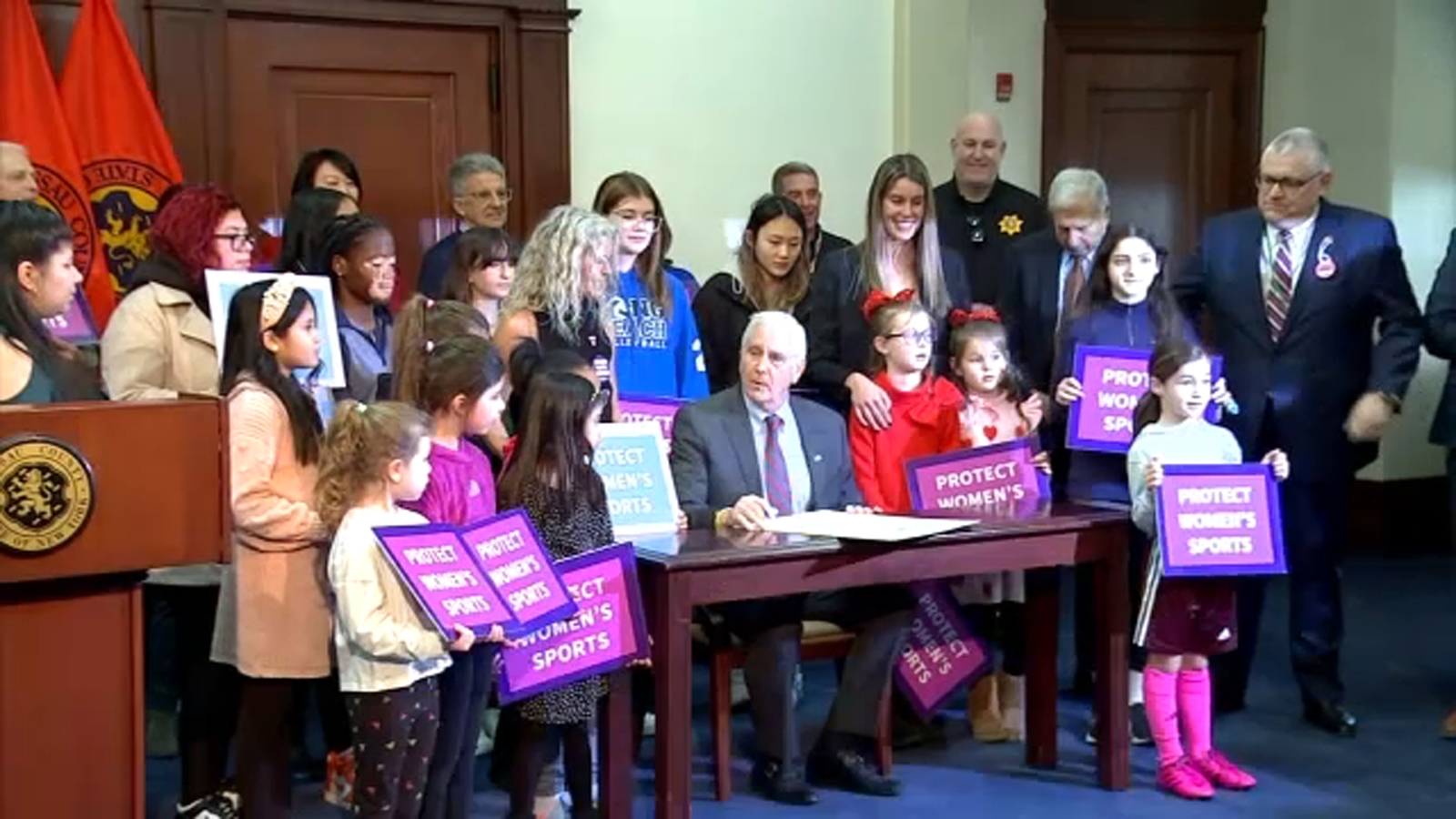 Featured image for "Nassau County Executive Files Lawsuit Against New York AG Over Transgender Athlete Ban"