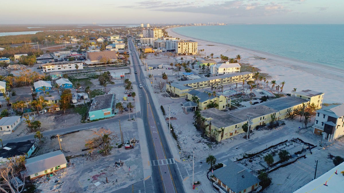 Featured image for Drone footage reveals lasting damage from Hurricane Ian on Fort Myers Beach.