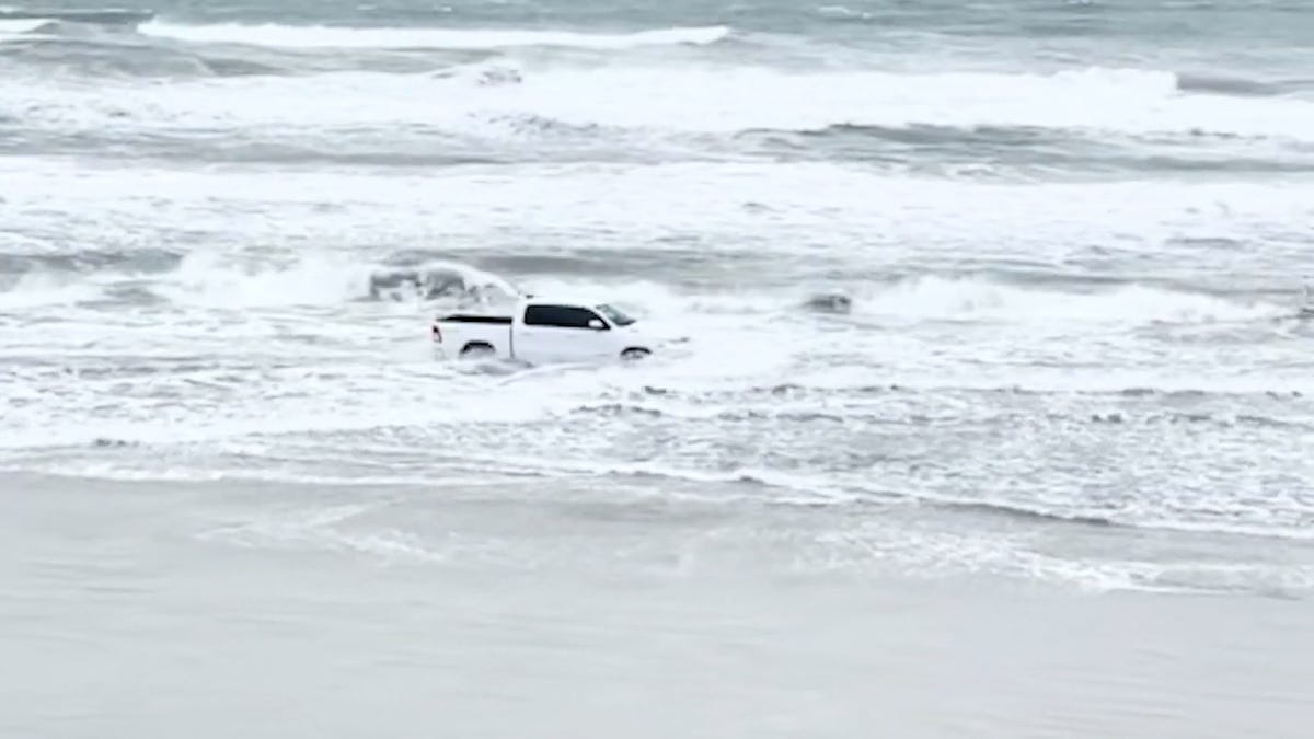 Featured image for Truck Driven into Ocean at Florida Beach Leads to Arrest