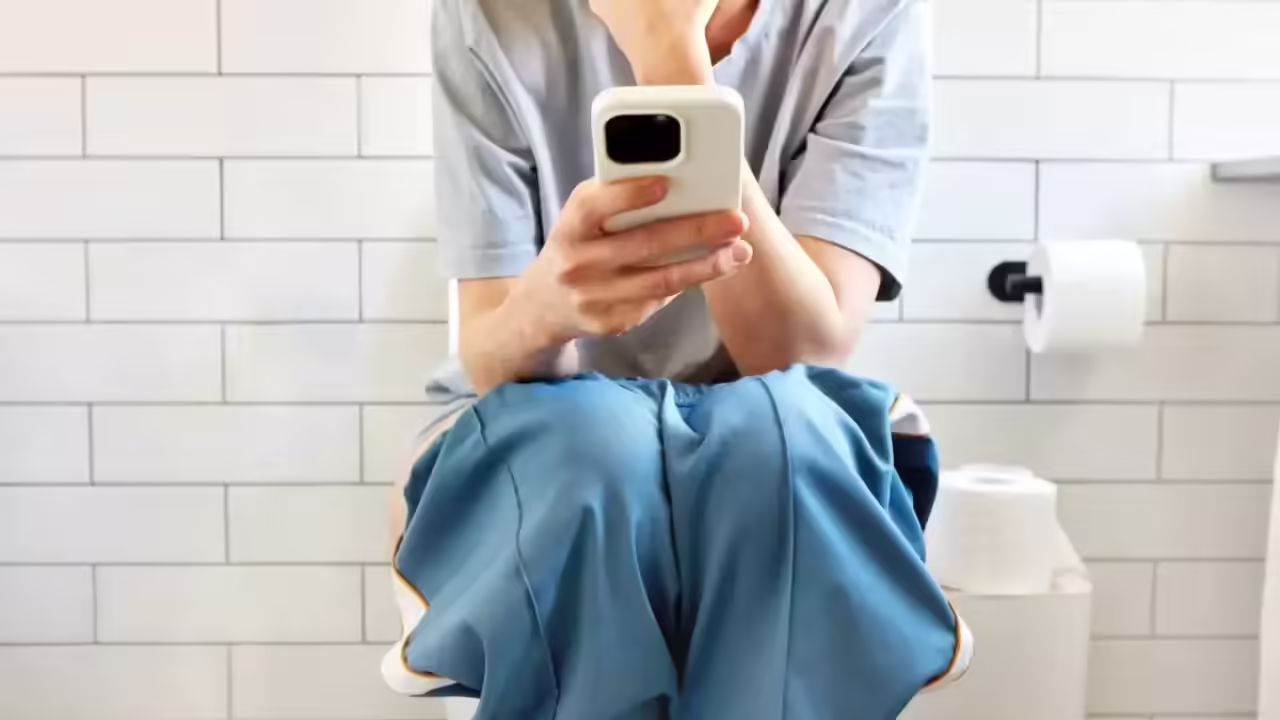 Featured image for Risks of Using Your Phone on the Toilet