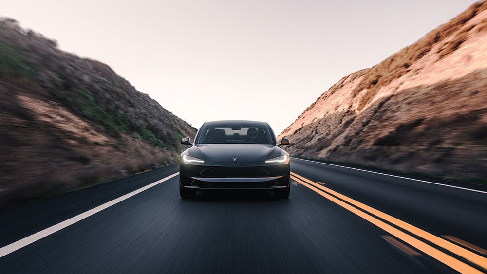 "Tesla and EV Giants Downgraded Amidst Slowing Demand and Stock Decline"