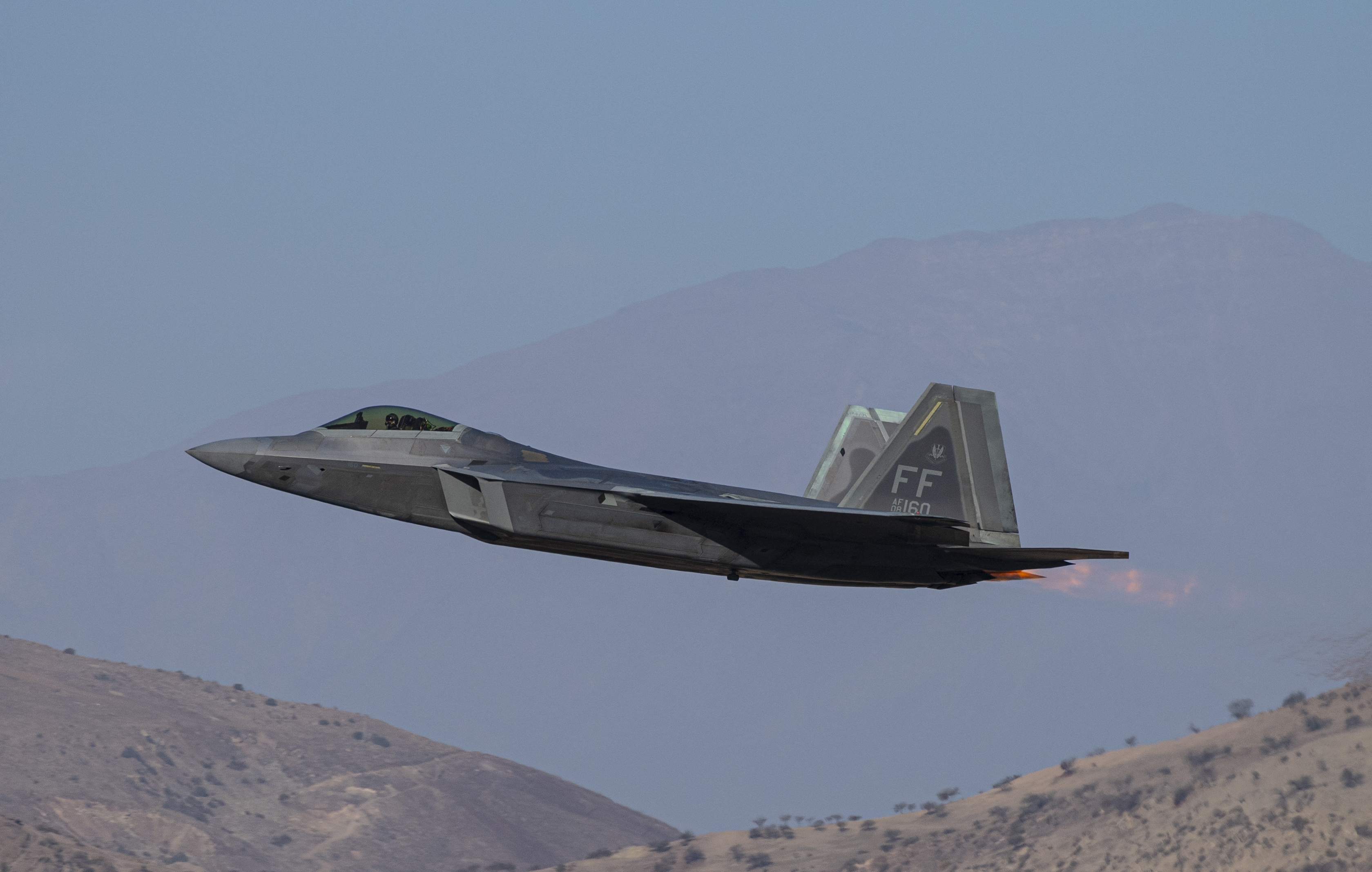 Featured image for F-22s deployed to Middle East in response to Russian aircraft activity.