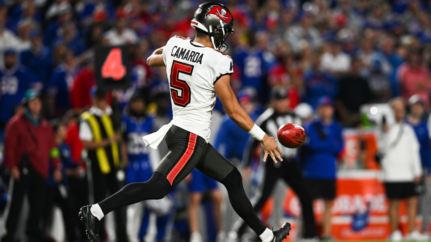 "Buccaneers Punter's Helmet Swing Escapes Penalty, Highlights Wild Game Against Bills"