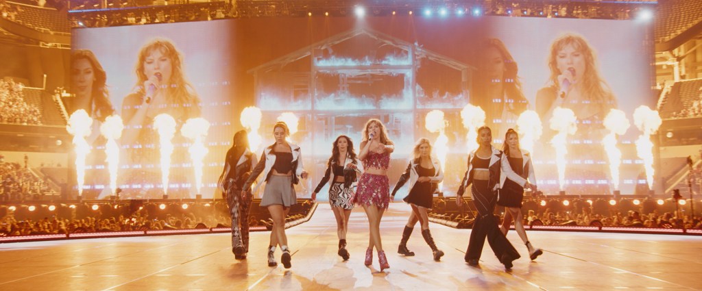 Featured image for Taylor Swift's 'Eras Tour' Disney+ Trailer Unveils Bonus Acoustic Performance of "Maroon"