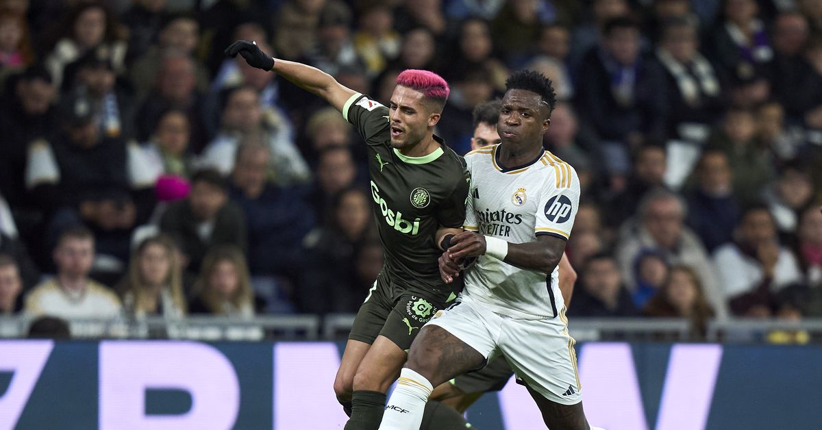 "Vinícius Jr and Bellingham Shine as Real Madrid Crush Girona 4-0 in La Liga"