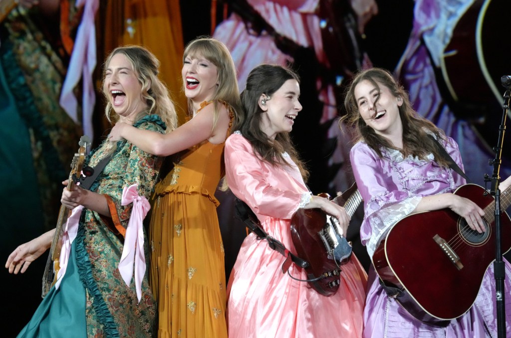 Featured image for Haim's Surprise Appearance as 'Bejeweled' Stepsisters Steals the Show with Taylor Swift