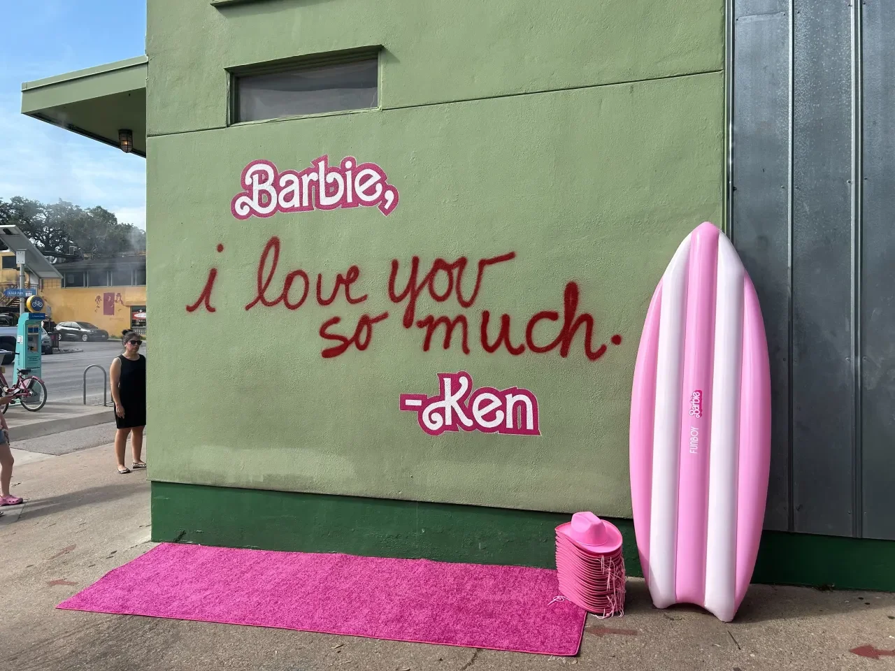 "Ken and Barbie Bring Love to Austin's Iconic Mural Ahead of Movie Release"