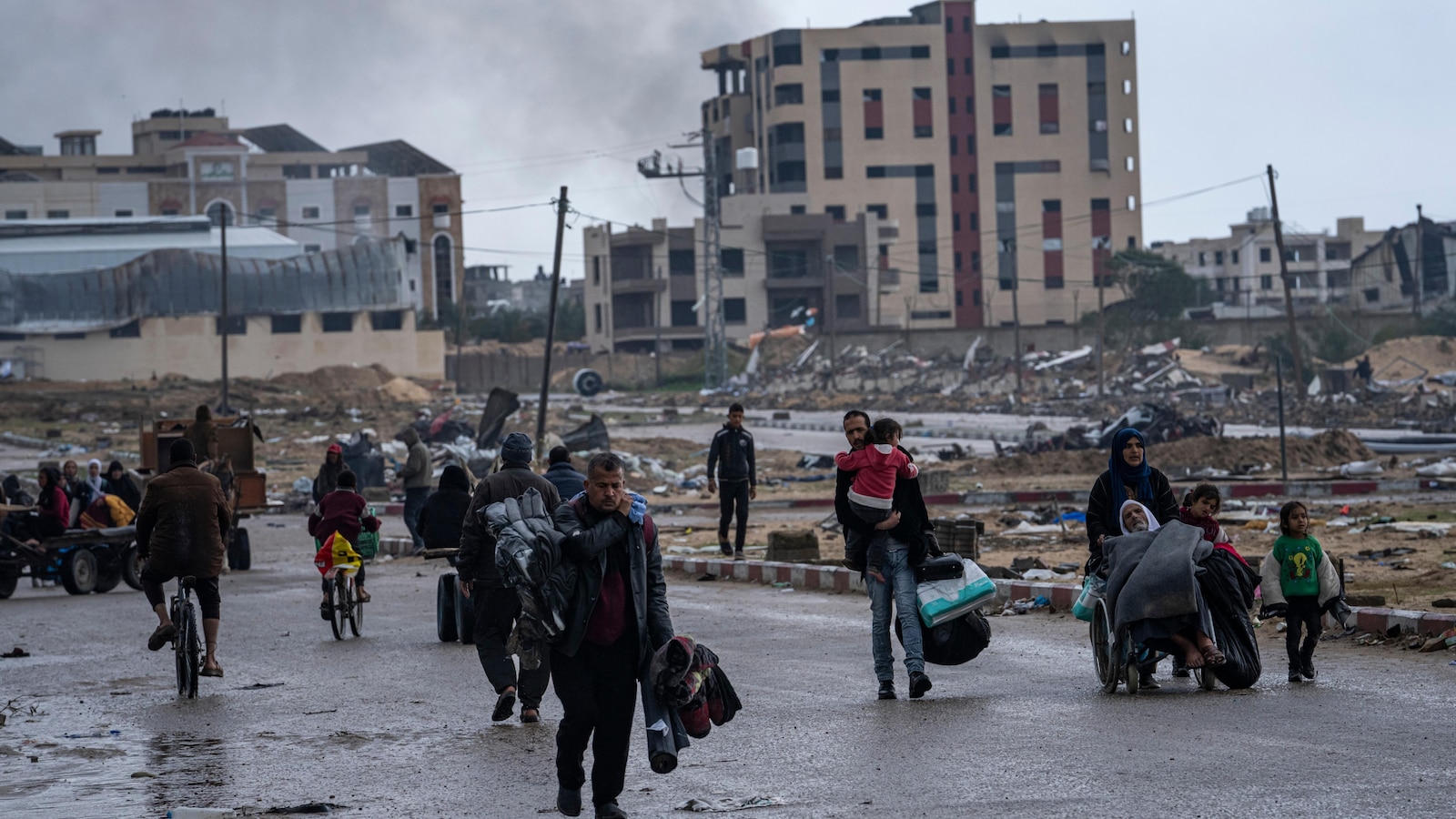 "Israel-Hamas Conflict: 215 Palestinians Killed in 24 Hours, Canada Restarts Funding with $40 Million"