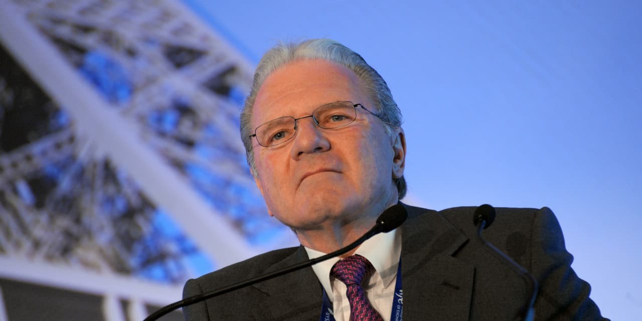 Billionaire Thomas Peterffy predicts a lower market, dismissing U.S. soft landing hopes.
