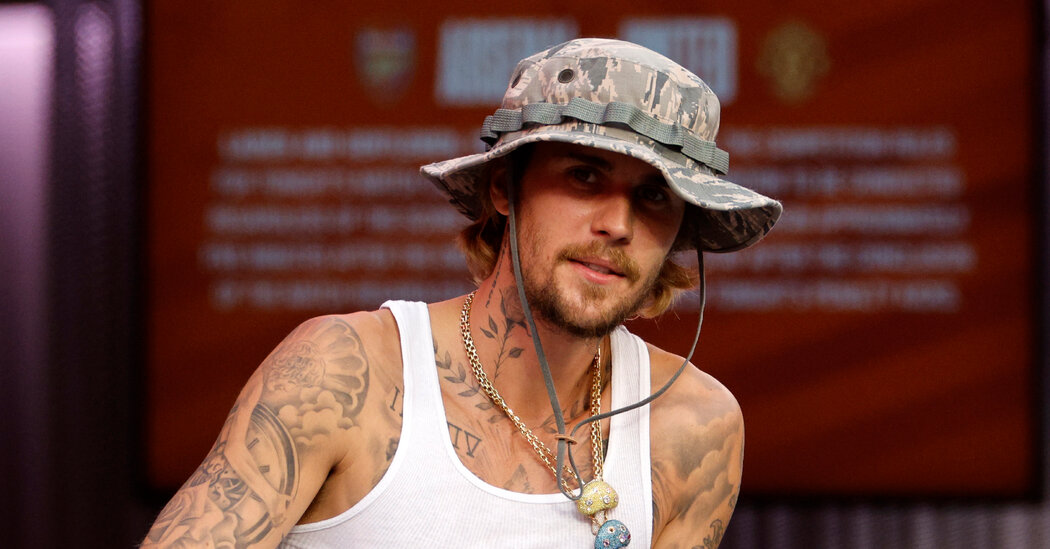 Featured image for Justin Bieber Claps Back at Paparazzi and Critics