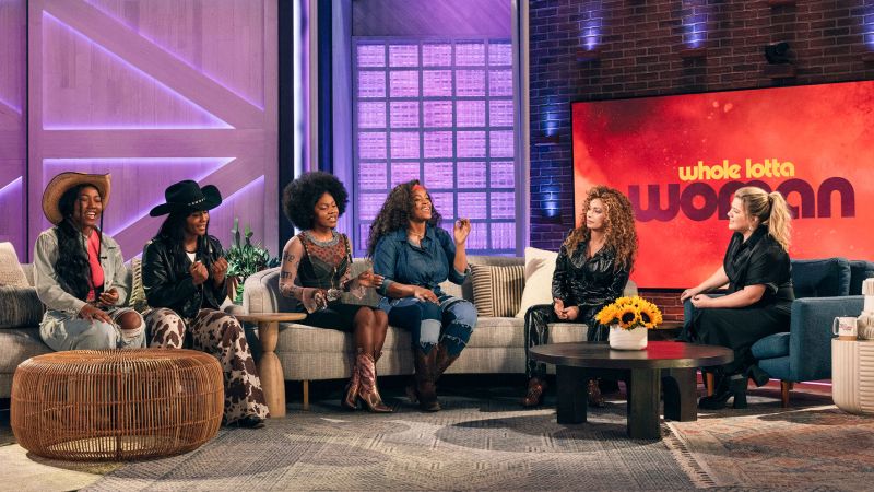 Shania Twain advocates for diversity and defends daring outfits in country music.