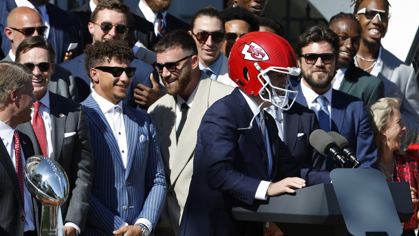 Featured image for President Biden Wears Chiefs Helmet, Jokes with Team at White House Celebration