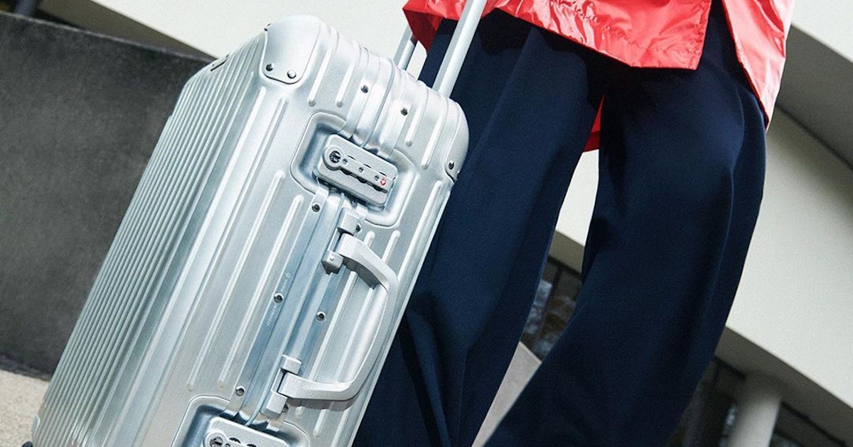 Featured image for Fashion's Favorite Luggage: Rimowa Suitcase Exhibit in NYC Showcases Iconic Travel Accessories, Including Discounted Backpacks and Target Totes