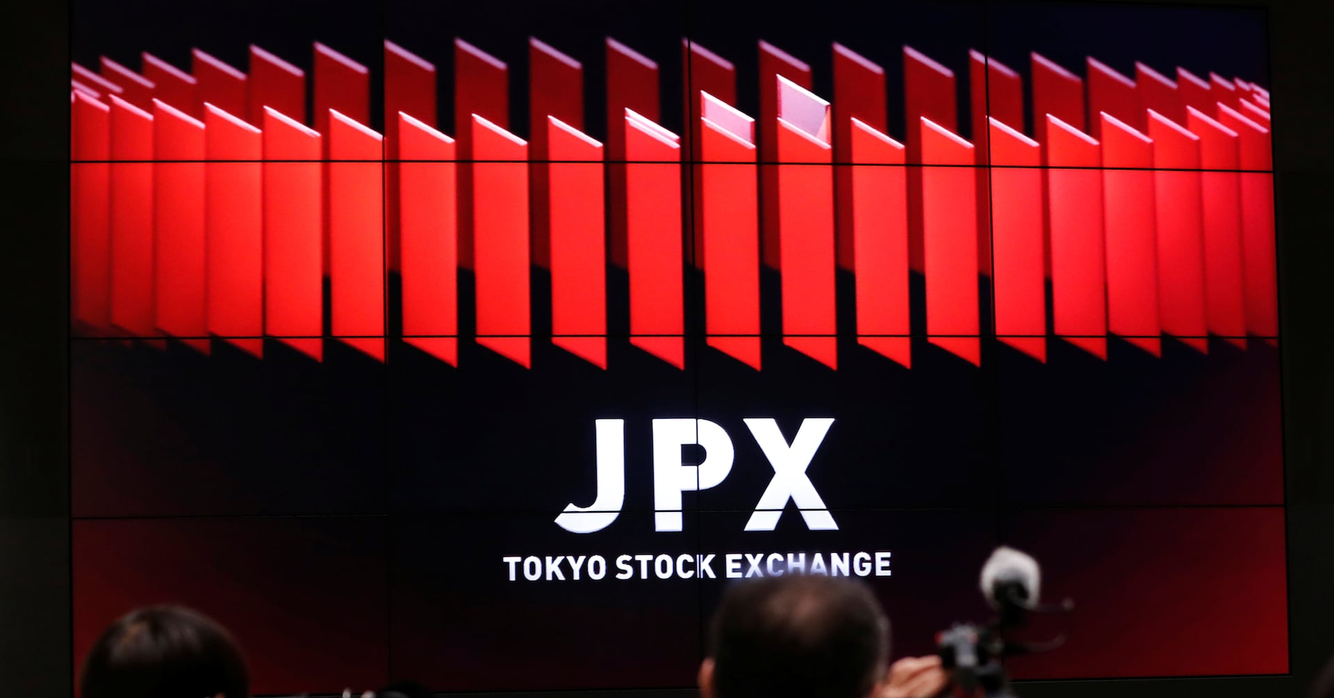 Featured image for "Asia's Markets Rally as Commodities Soar and Disney Shareholders Support CEO"