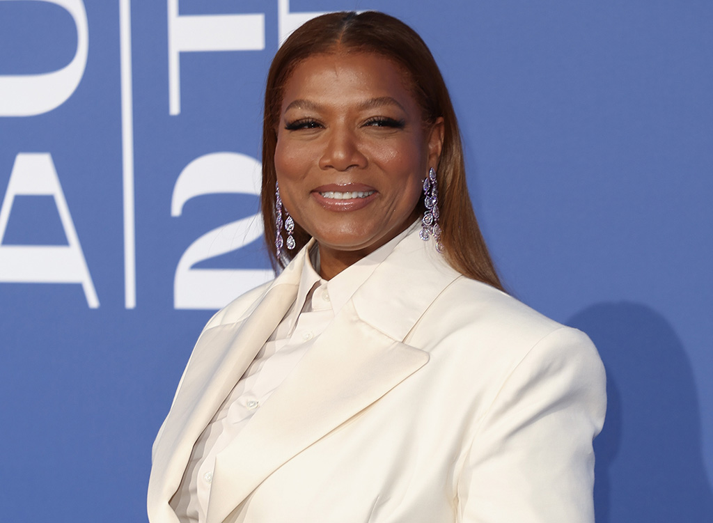 Queen Latifah and Eboni Nichols steal the show at amfAR Gala Cannes 2023 in matching tuxedo looks.