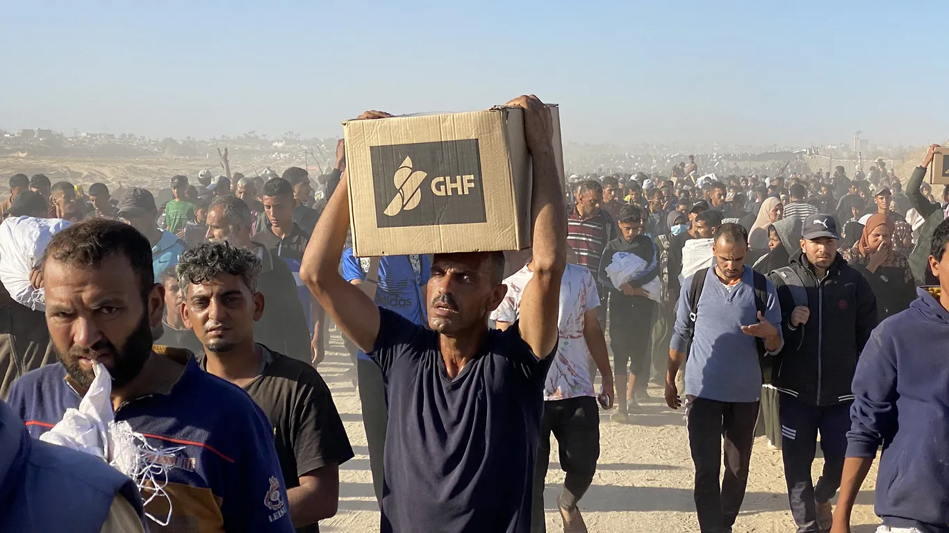 Israeli Fire Kills Dozens Near Gaza Aid Centers