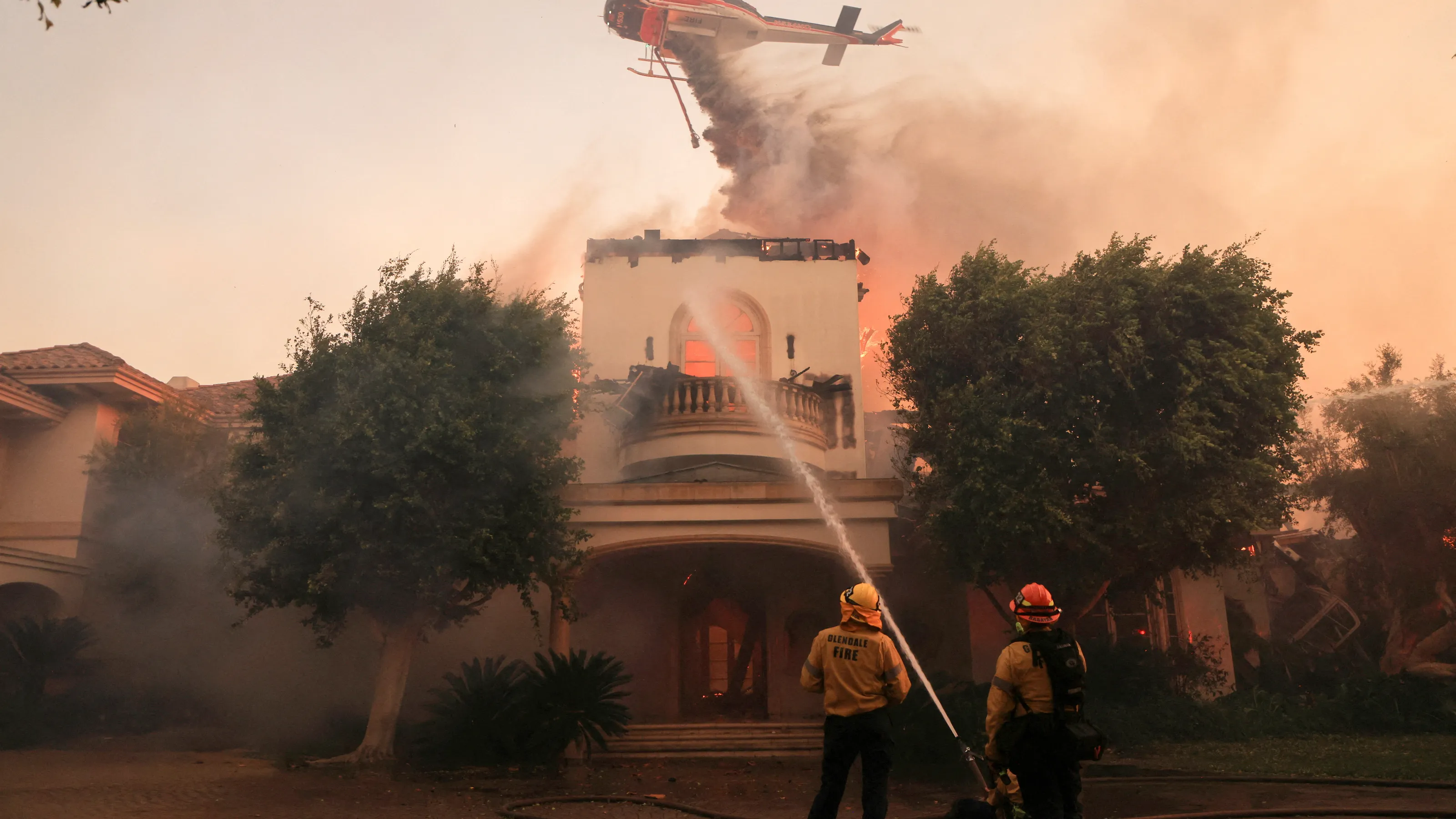 Featured image for California Wildfires Devastate Homes and Trigger Mass Evacuations