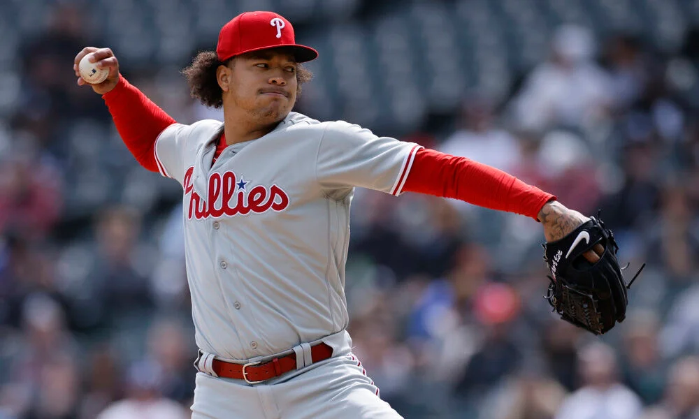 "Phillies Secure Wild Card Spot with Walker's Seventh-Inning Battle against Marlins"