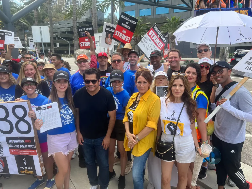"Strikers Demand Safe Zone Outside NBCUniversal; Studio Faces Backlash"