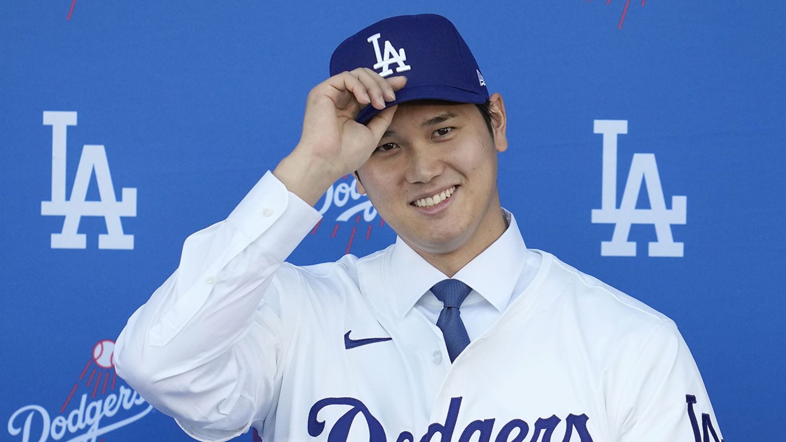 "Shohei Ohtani's Dodgers Contract Offers Tax Benefits, Delights Fans, Amidst MLB Turmoil"