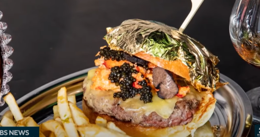 Featured image for "US Restaurant Serves $700 Gold Standard Burger with Edible Gold Leaf"