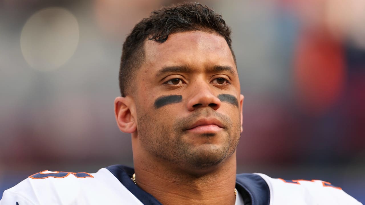 "Russell Wilson's Bench Saga: Contract Dispute, Coach Conflicts, and Future Prospects"