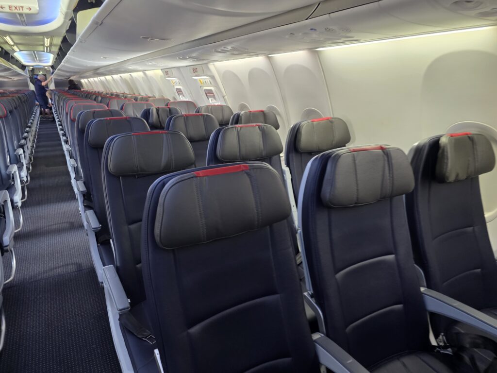 Featured image for American Airlines Rebounds with Improved Profit Outlook Amid Travel Demand Challenges