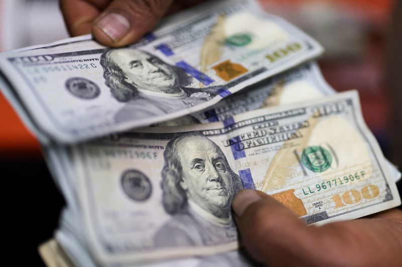 Dollar Rises on Trump Tariffs; Bitcoin Hits Record High