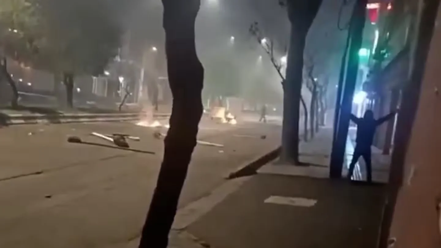 Witnesses say security forces shot protesters fleeing Rasht bazaar fire