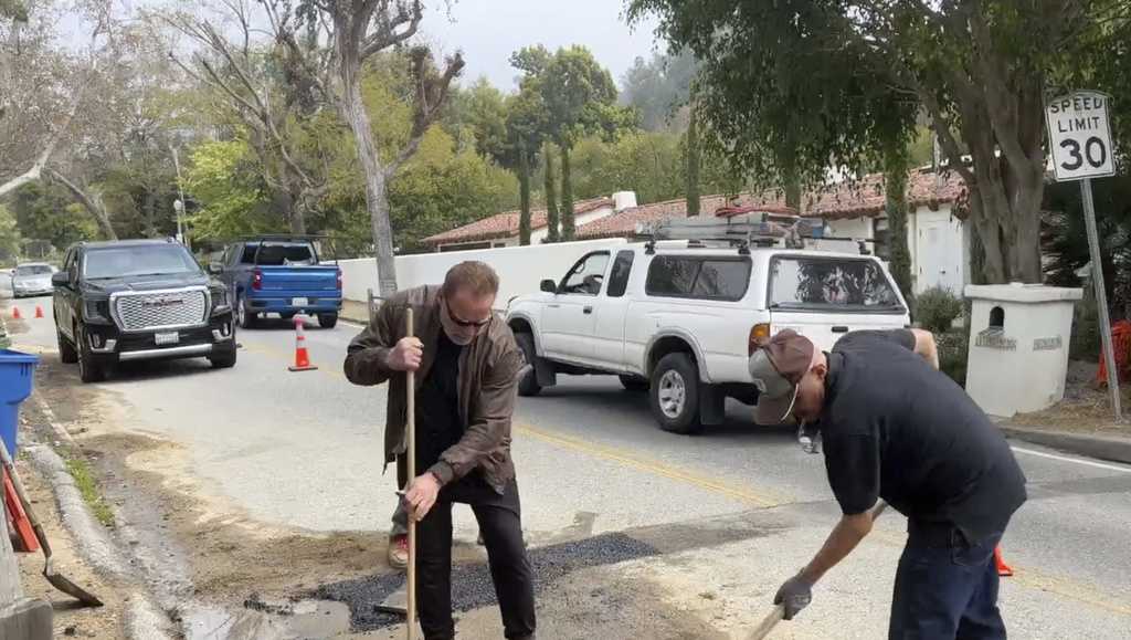 Featured image for Arnold Schwarzenegger Takes Matters into His Own Hands and Fills LA Pothole.