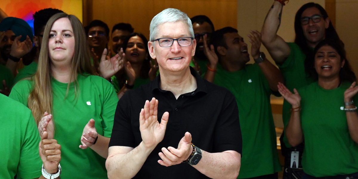 Tim Cook emphasizes caution with AI despite its potential, avoids mass layoffs at Apple.