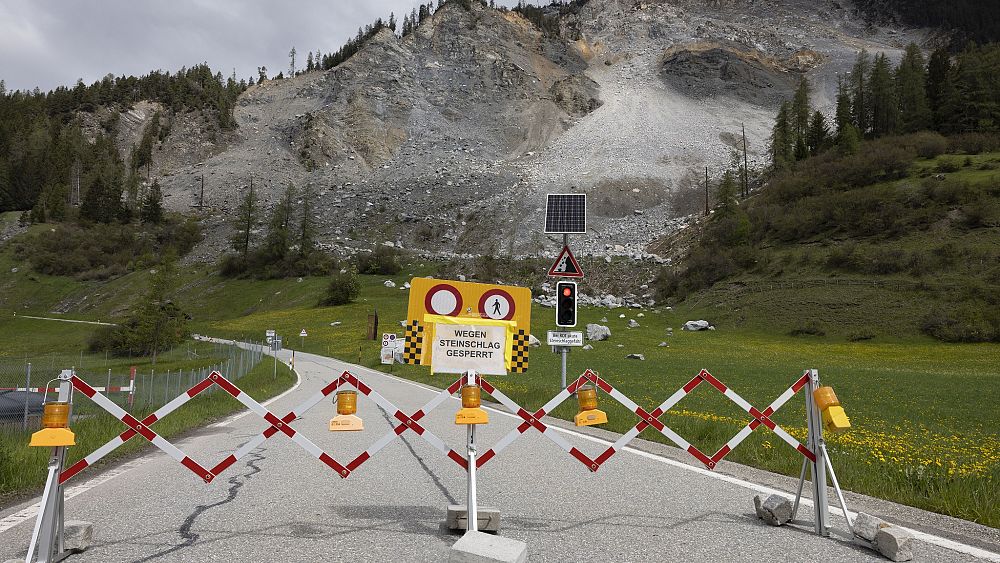 Featured image for Swiss villagers flee impending rockslide.