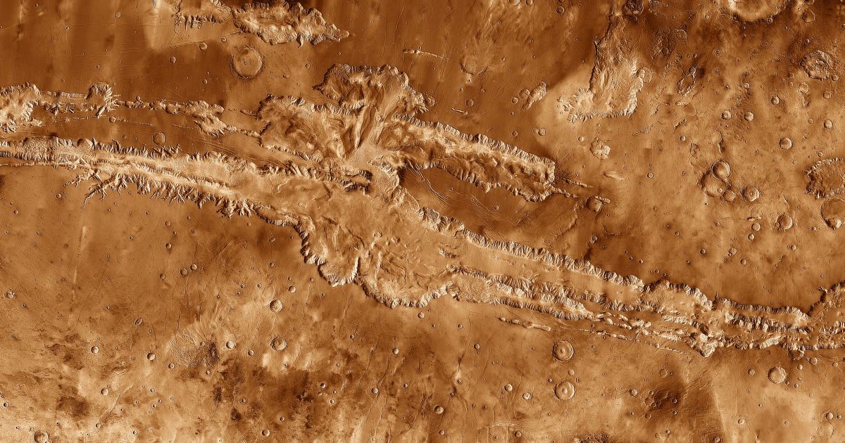 Featured image for "The Martian Mystery: Unraveling the Grand Canyon of Mars"
