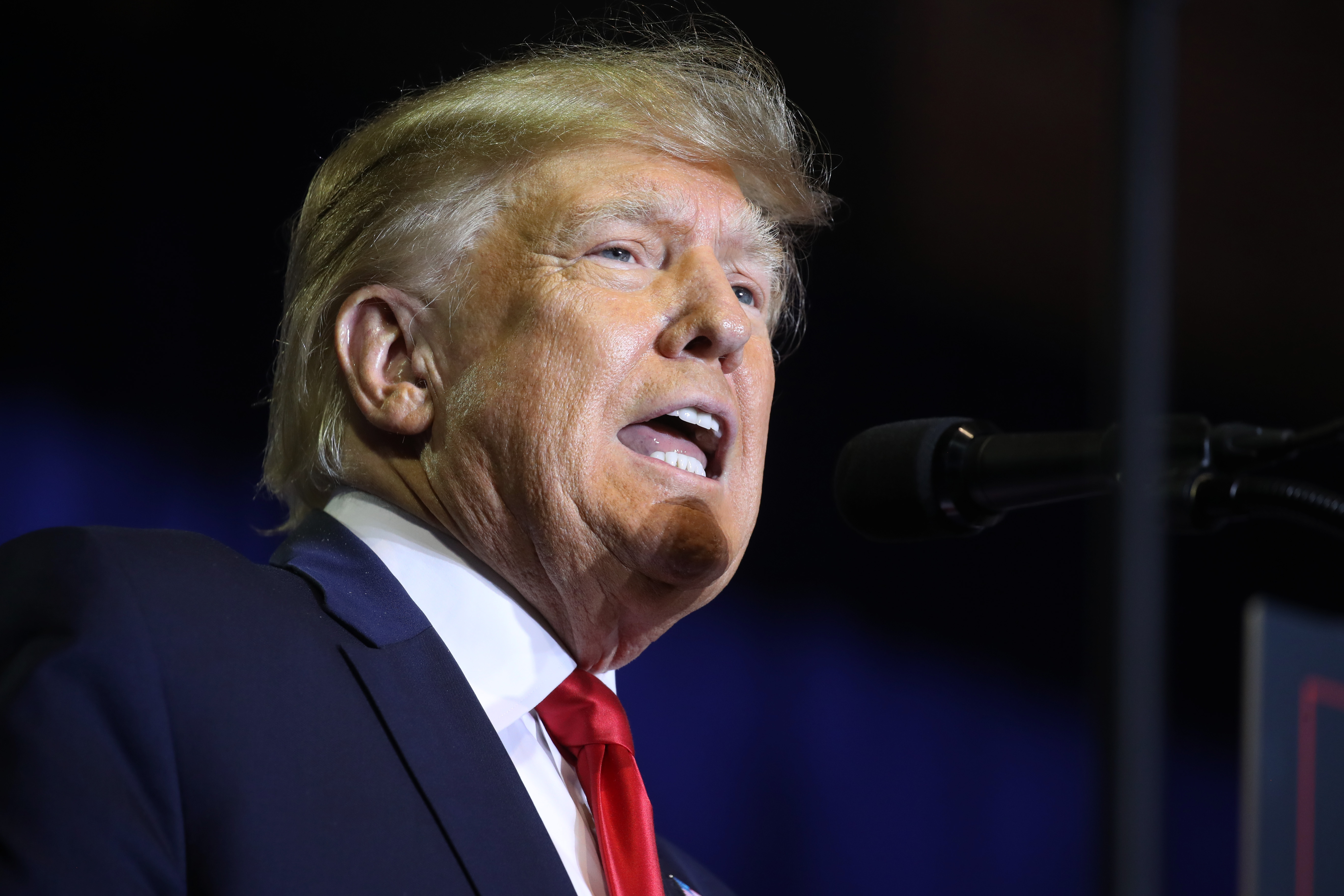 Trump dismisses indictment as a joke while Cohen reacts.
