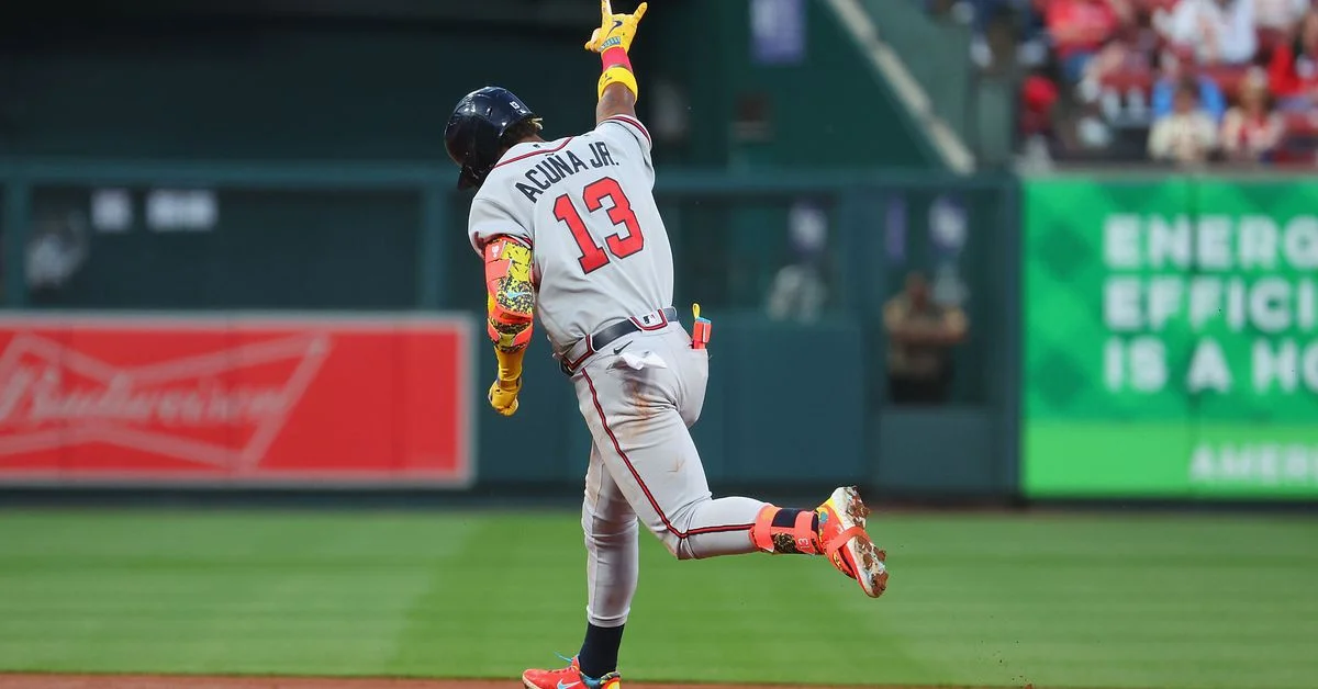 "Braves dominate Cardinals with three homers in 8-4 win"