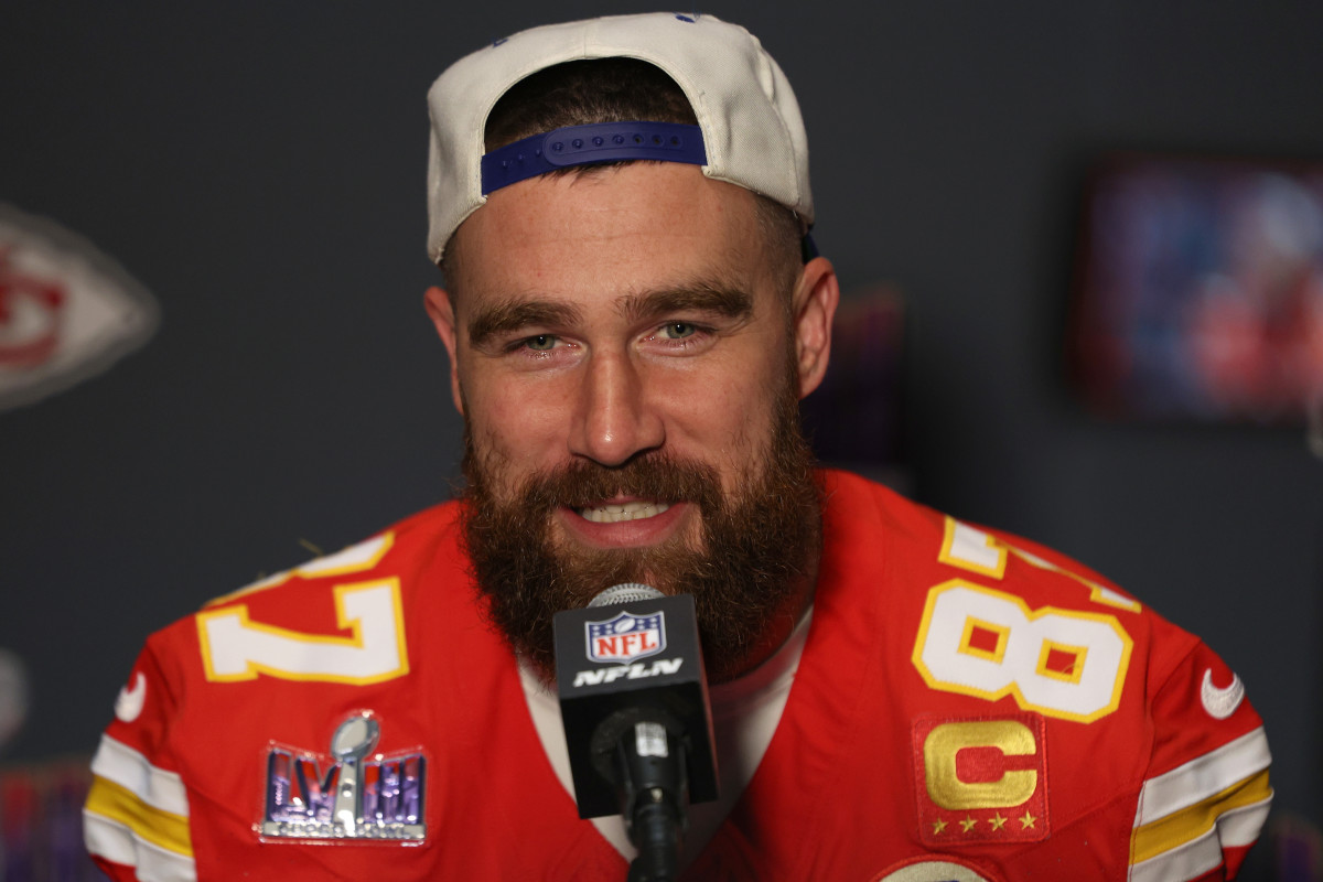 "Travis Kelce's Response to Taylor Swift Questions and Surprise Album Announcement"